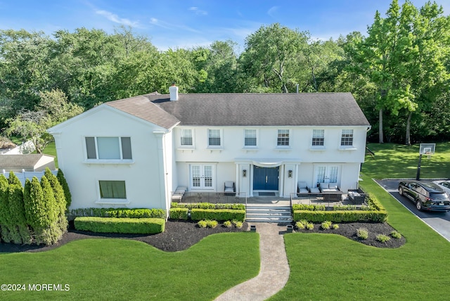 view of front of house with a front yard