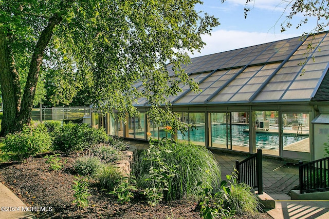 exterior space featuring a community pool