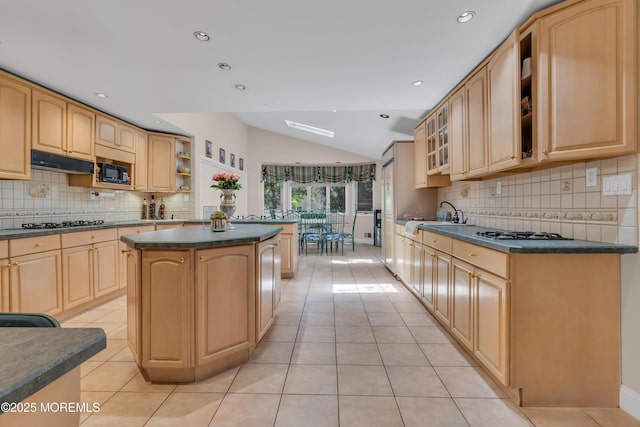 65 Chicanos Dr, Lakewood, NJ 08701 - kitchen featuring vaulted ceiling, open shelves, dark countertops, a center island, and tasteful backsplash