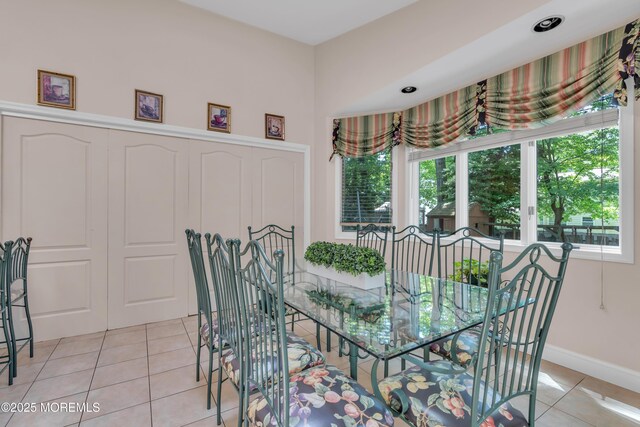 65 Chicanos Dr, Lakewood, NJ 08701 - dining space with light tile patterned floors and baseboards