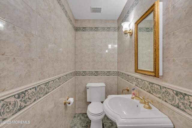 65 Chicanos Dr, Lakewood, NJ 08701 - bathroom featuring tile walls and toilet