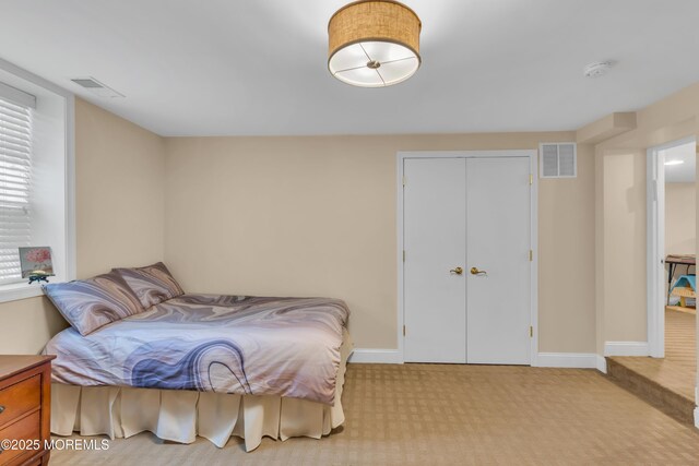65 Chicanos Dr, Lakewood, NJ 08701 - carpeted bedroom featuring baseboards and a closet