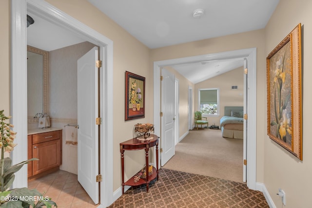 65 Chicanos Dr, Lakewood, NJ 08701 - corridor featuring vaulted ceiling and light carpet