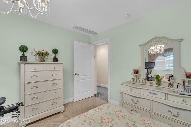 65 Chicanos Dr, Lakewood, NJ 08701 - bedroom with a chandelier and light carpet