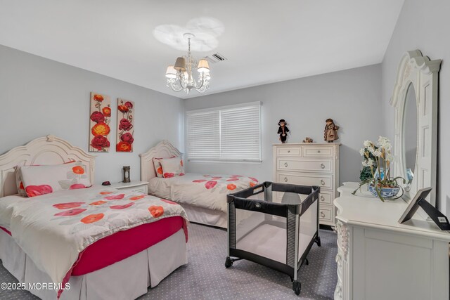 65 Chicanos Dr, Lakewood, NJ 08701 - bedroom featuring a chandelier and carpet floors