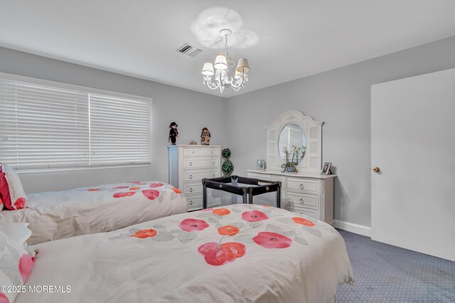 65 Chicanos Dr, Lakewood, NJ 08701 - carpeted bedroom with a chandelier and baseboards