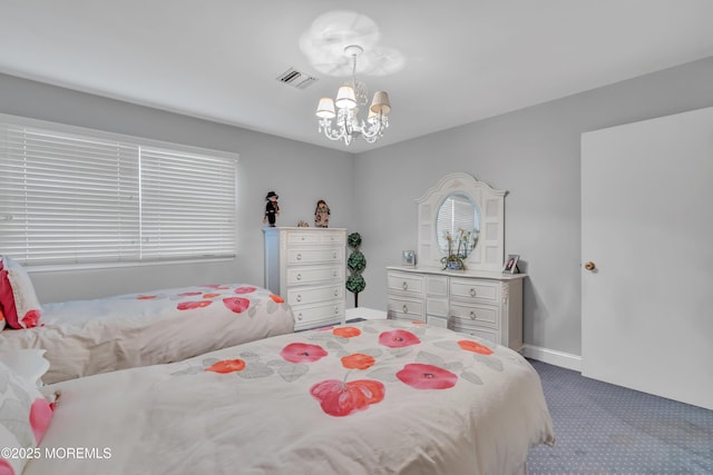 65 Chicanos Dr, Lakewood, NJ 08701 - carpeted bedroom with a chandelier and baseboards