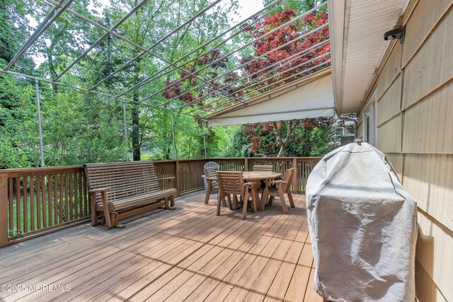 65 Chicanos Dr, Lakewood, NJ 08701 - wooden deck with outdoor dining area