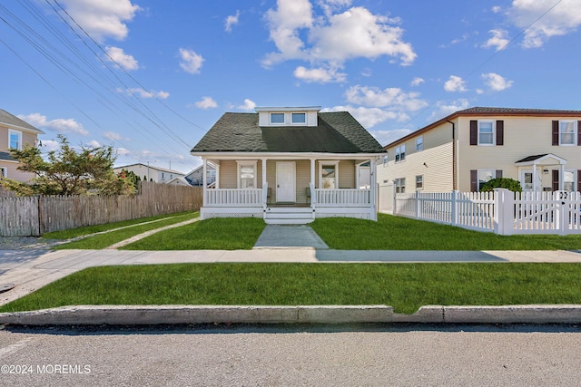 107 18th Ave, Belmar, NJ 07719 - bungalow featuring a porch and roof with shingles