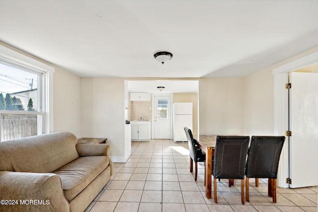 107 18th Ave, Belmar, NJ 07719 - living room featuring light tile patterned floors and baseboards