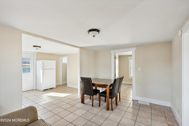 107 18th Ave, Belmar, NJ 07719 - dining room with light tile patterned floors and baseboards