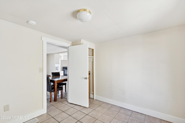 107 18th Ave, Belmar, NJ 07719 - unfurnished room with light tile patterned floors and baseboards