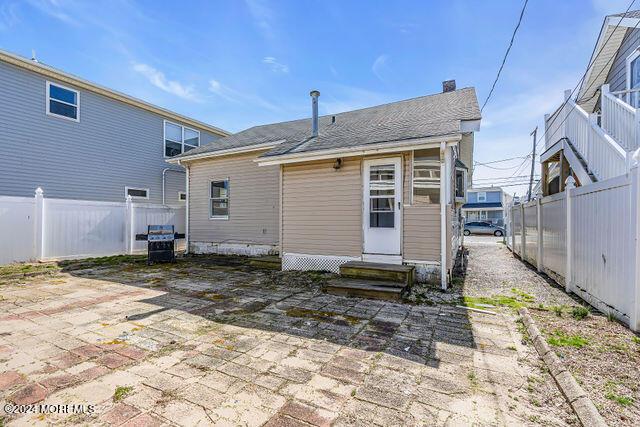 rear view of house featuring a patio area