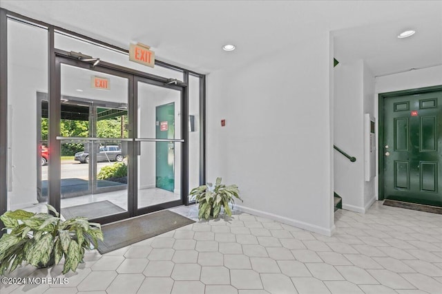 property entrance featuring french doors