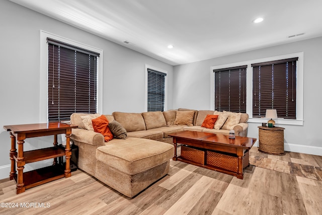 living room with light hardwood / wood-style flooring