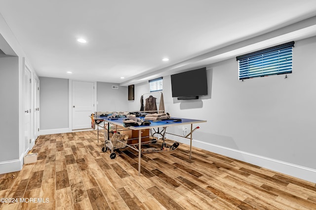 rec room featuring light hardwood / wood-style floors