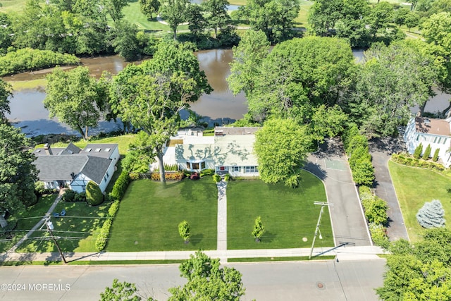 birds eye view of property featuring a water view