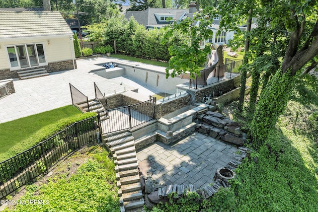 view of pool featuring a patio area