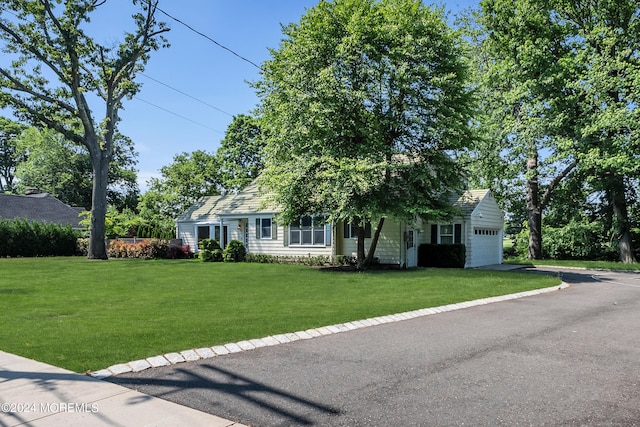 view of front of home with a front yard