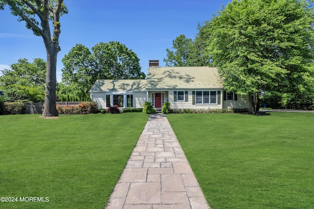 view of front of home with a front yard