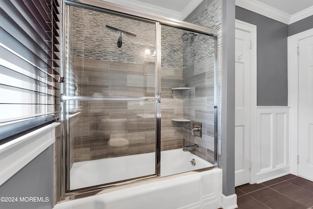 bathroom featuring tile flooring, shower / bath combination with glass door, and ornamental molding