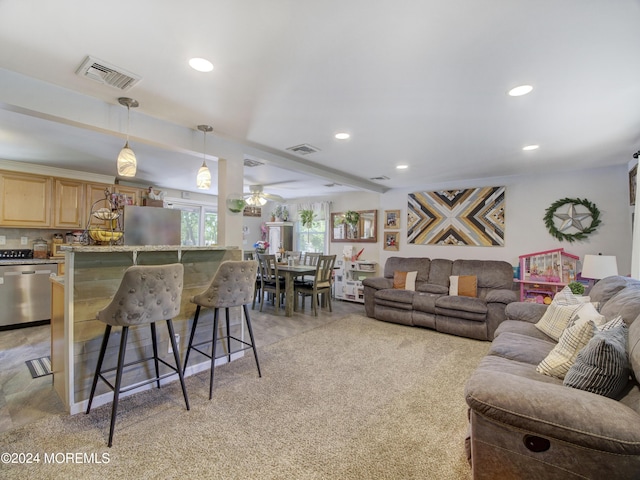 living room with ceiling fan