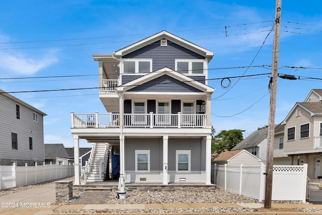 view of front of property with a balcony