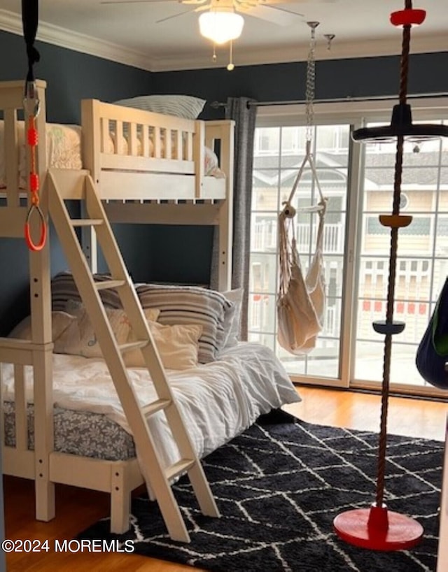 bedroom featuring ornamental molding, access to outside, hardwood / wood-style flooring, and ceiling fan