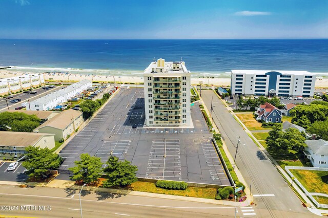 aerial view featuring a beach view and a water view