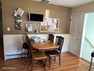 dining room with light wood-type flooring