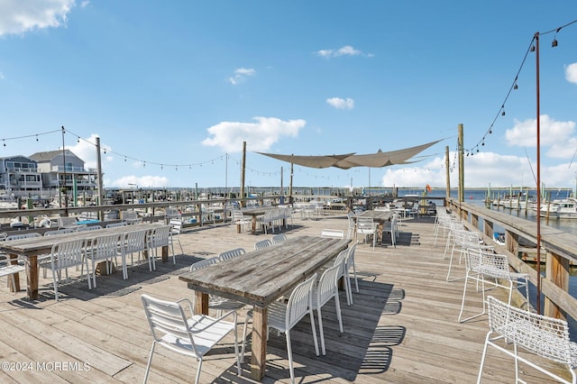 wooden terrace with a water view