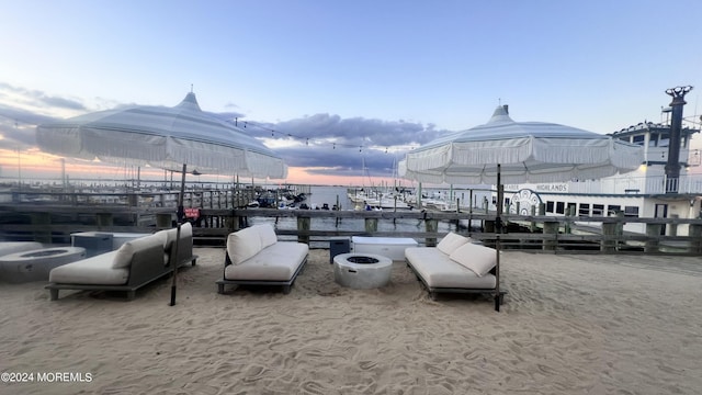 patio terrace at dusk with a water view