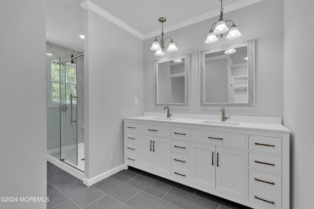 bathroom with a notable chandelier, vanity, ornamental molding, and walk in shower