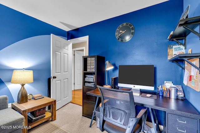 view of carpeted office space