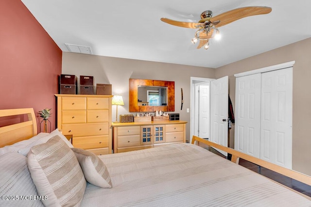 bedroom featuring a closet and ceiling fan