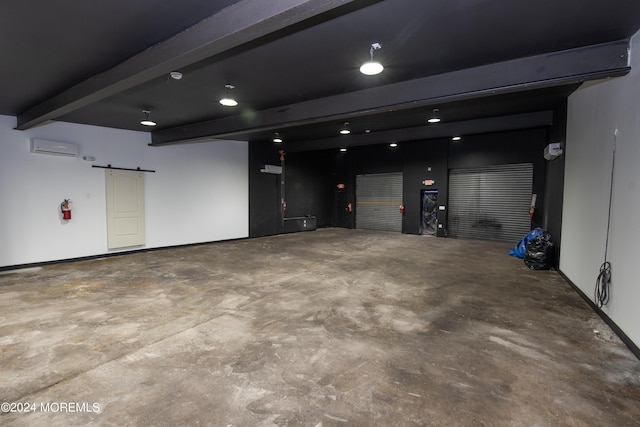 garage with a wall mounted air conditioner