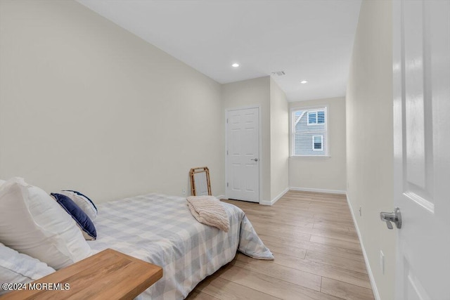 bedroom featuring light wood-type flooring