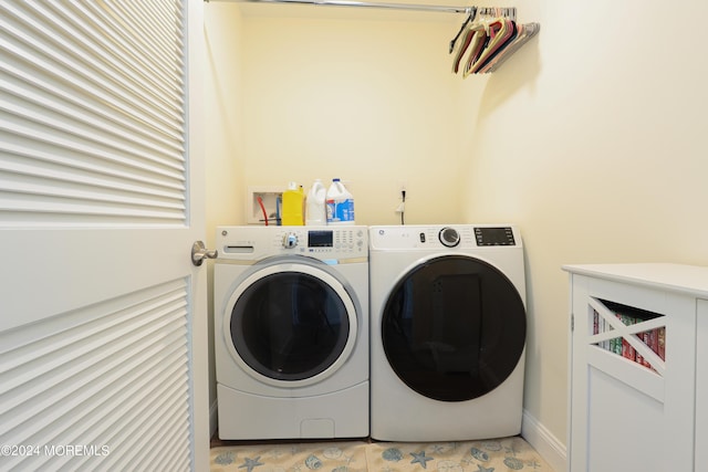 laundry room with washer and clothes dryer