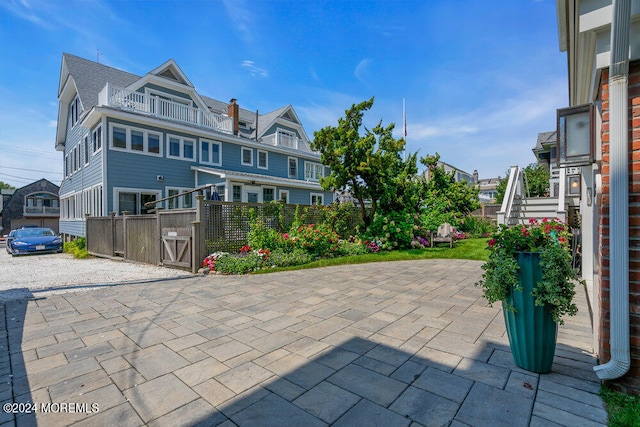 view of patio / terrace with a balcony