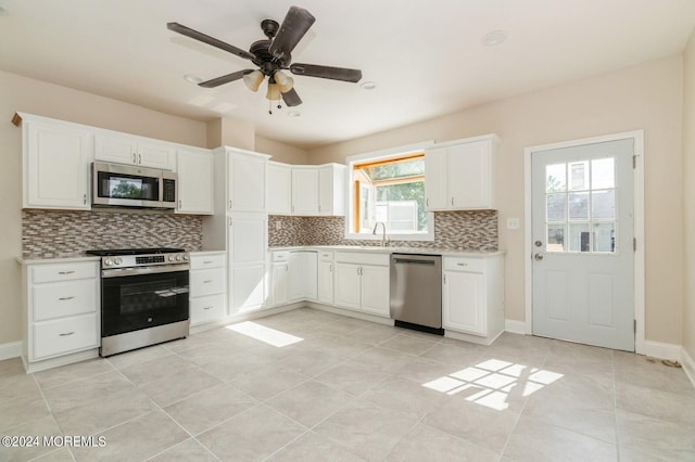 kitchen featuring white cabinets and stainless steel appliances