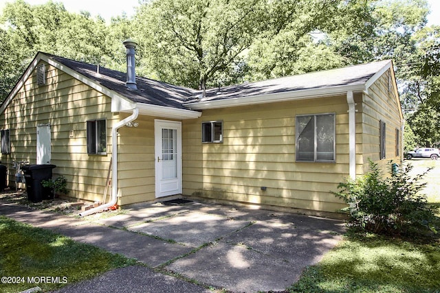 back of house featuring a patio