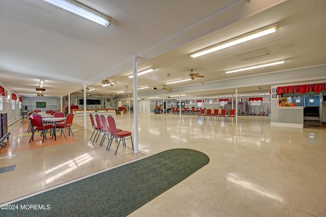 interior space featuring ceiling fan