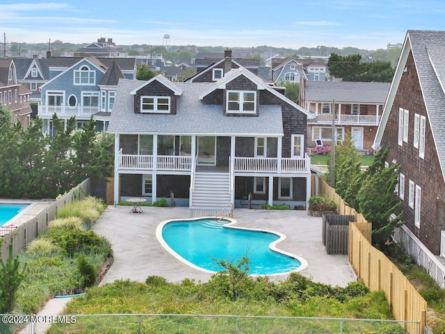 view of swimming pool with a patio