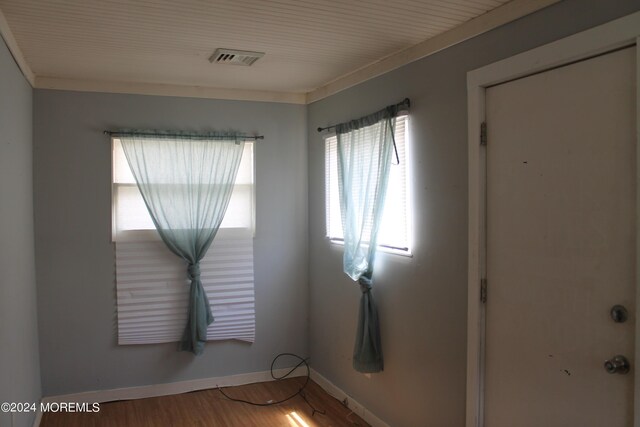 spare room featuring hardwood / wood-style flooring