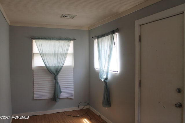 empty room with wood-type flooring