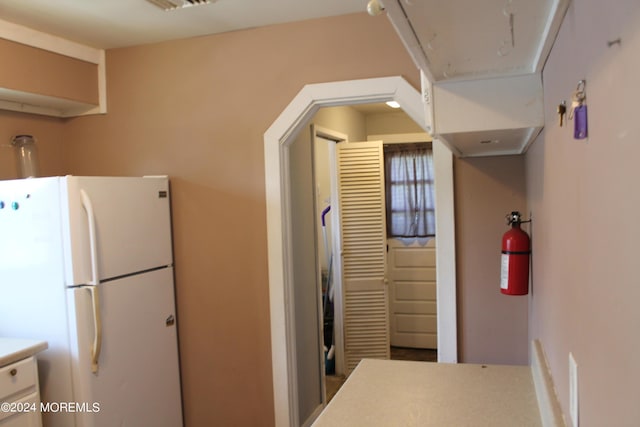 kitchen featuring white refrigerator