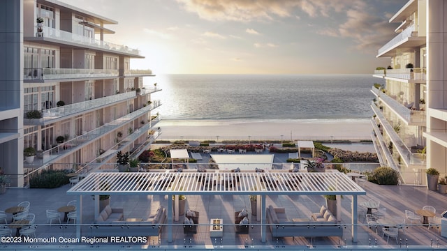 property view of water featuring a view of the beach