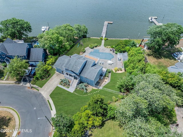 birds eye view of property featuring a water view