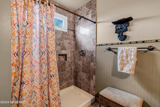 bathroom with a shower with shower curtain