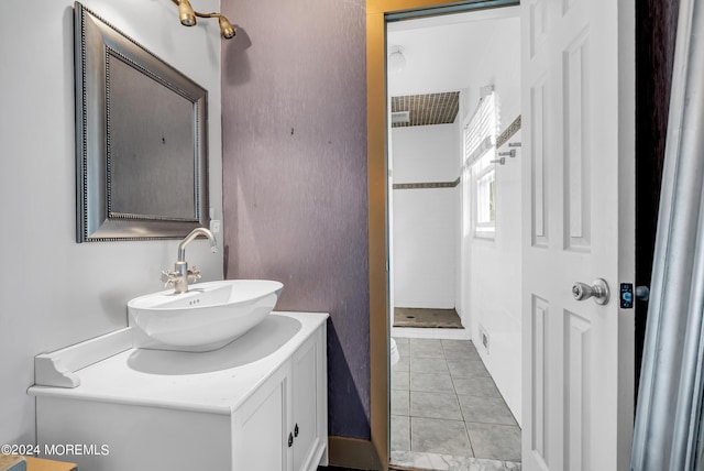 bathroom with vanity and tile patterned floors